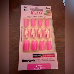 Pink glue on nails